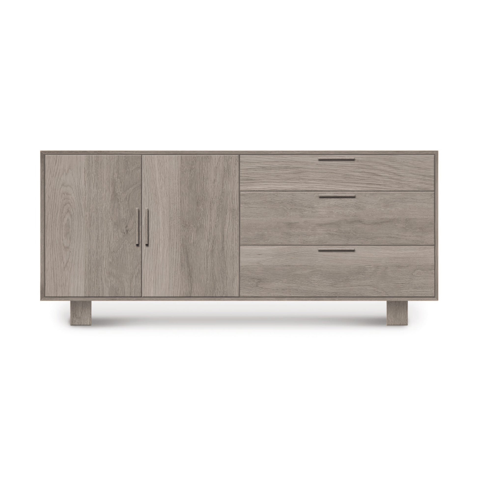 Modern wooden sideboard, known as the Copeland Furniture Iso 2 Door, 3 Side Drawer Buffet, with two doors and three drawers against a white background, features solid wood construction.