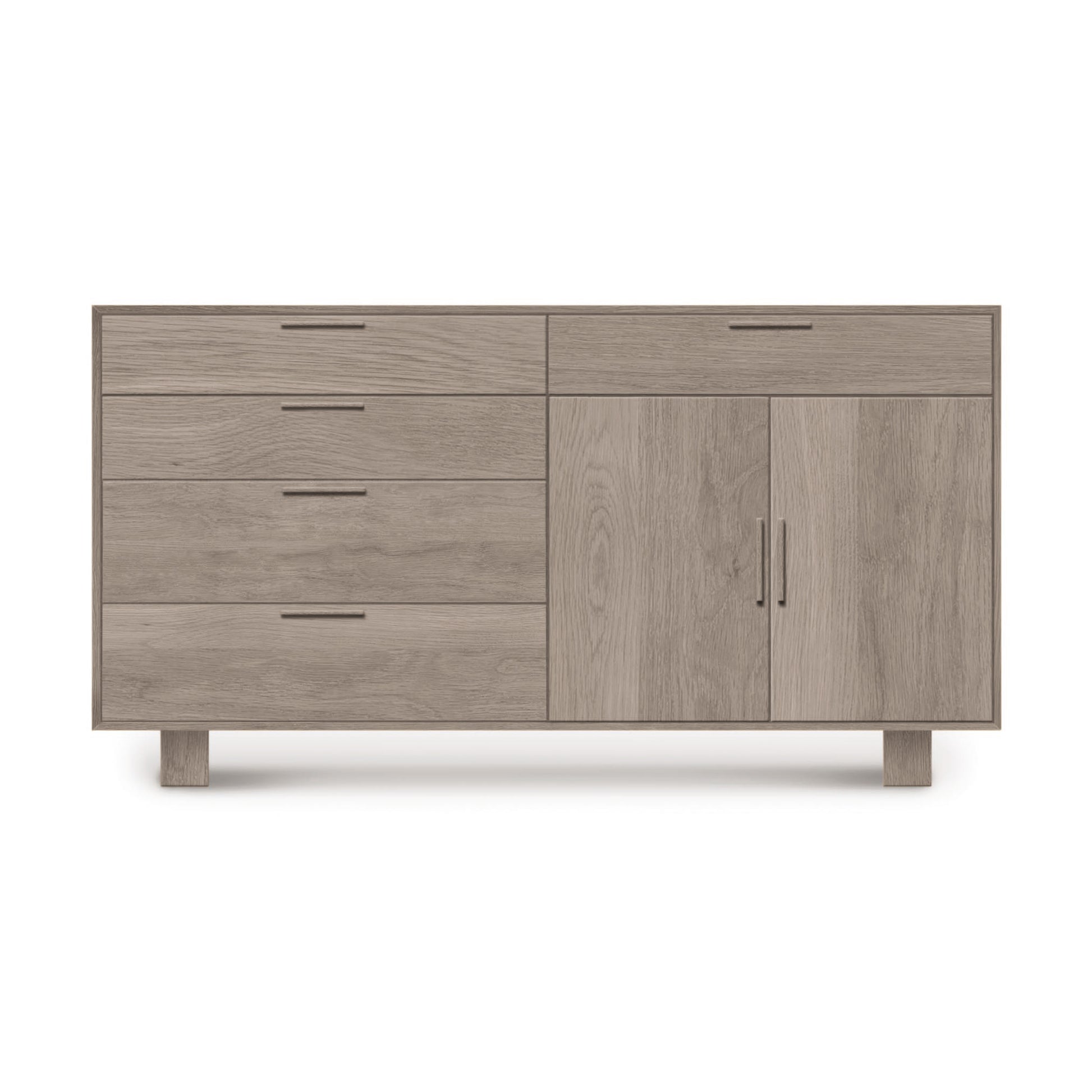A modern Copeland Furniture Iso Oak 2 Door, 5 Drawer Buffet with drawers on the left and a cabinet section on the right against a white background, showcasing solid hardwood oak.