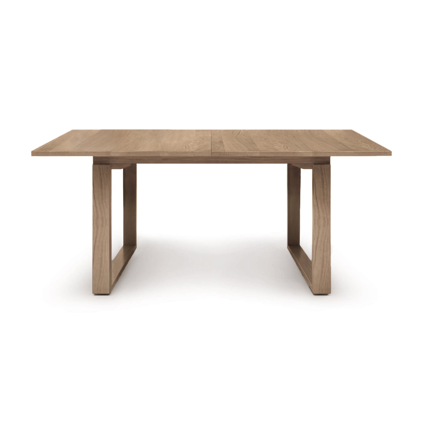 A Copeland Furniture Iso Extension Dining Table with a simple, modern design on a white background.