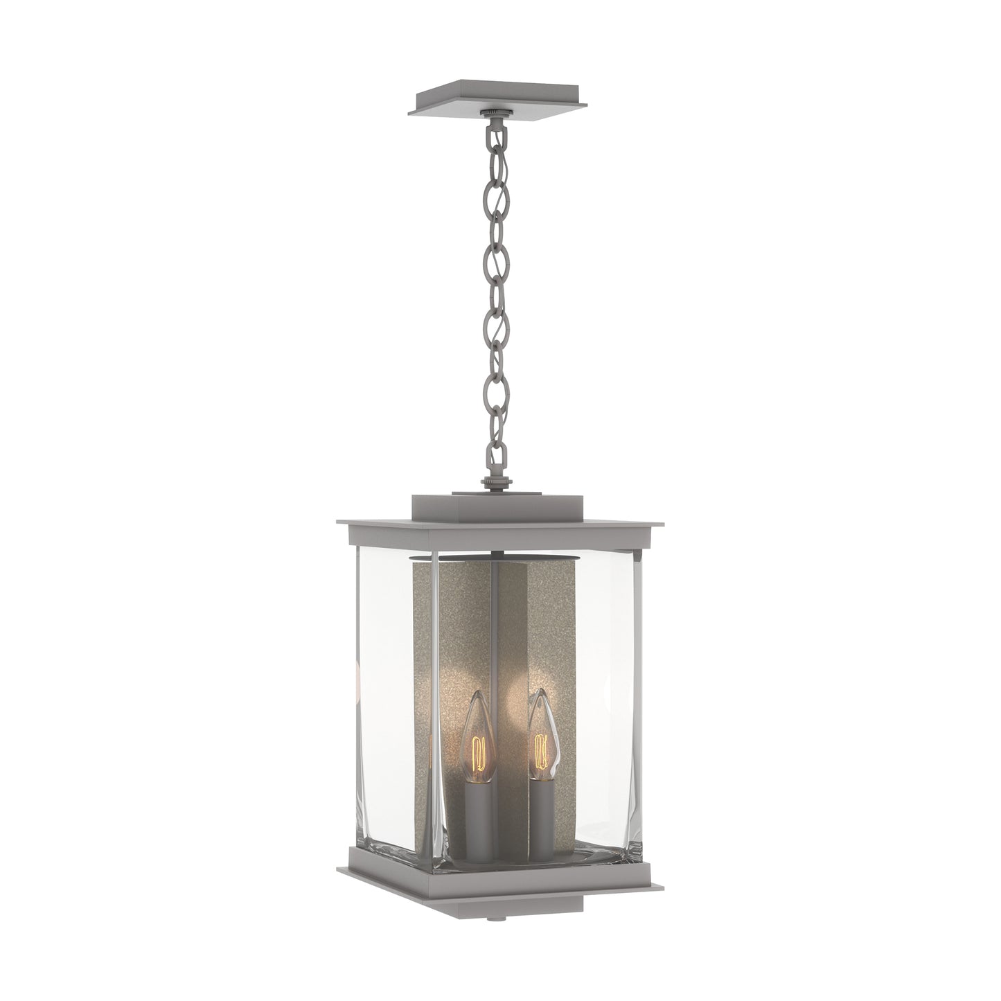 Kingston Outdoor Large Lantern by Hubbardton Forge with clear glass panels and two candle-style bulbs, suspended from a chain.