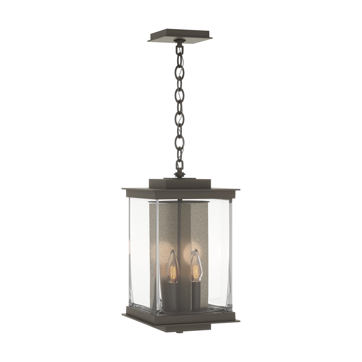 Kingston Outdoor Large Lantern by Hubbardton Forge featuring a Coastal Bronze frame, clear glass panels, and candle-style bulbs.