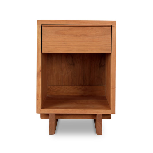 Kipling 1-Drawer Enclosed Shelf Nightstand by Vermont Furniture Designs, showcasing a sleek, modern design with natural wood and a smooth finish.