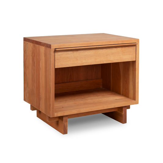 Kipling 1-Drawer Enclosed Shelf Wide Nightstand from Vermont Furniture Designs features a sleek finish, modern design, single drawer, and open shelf on short legs.
