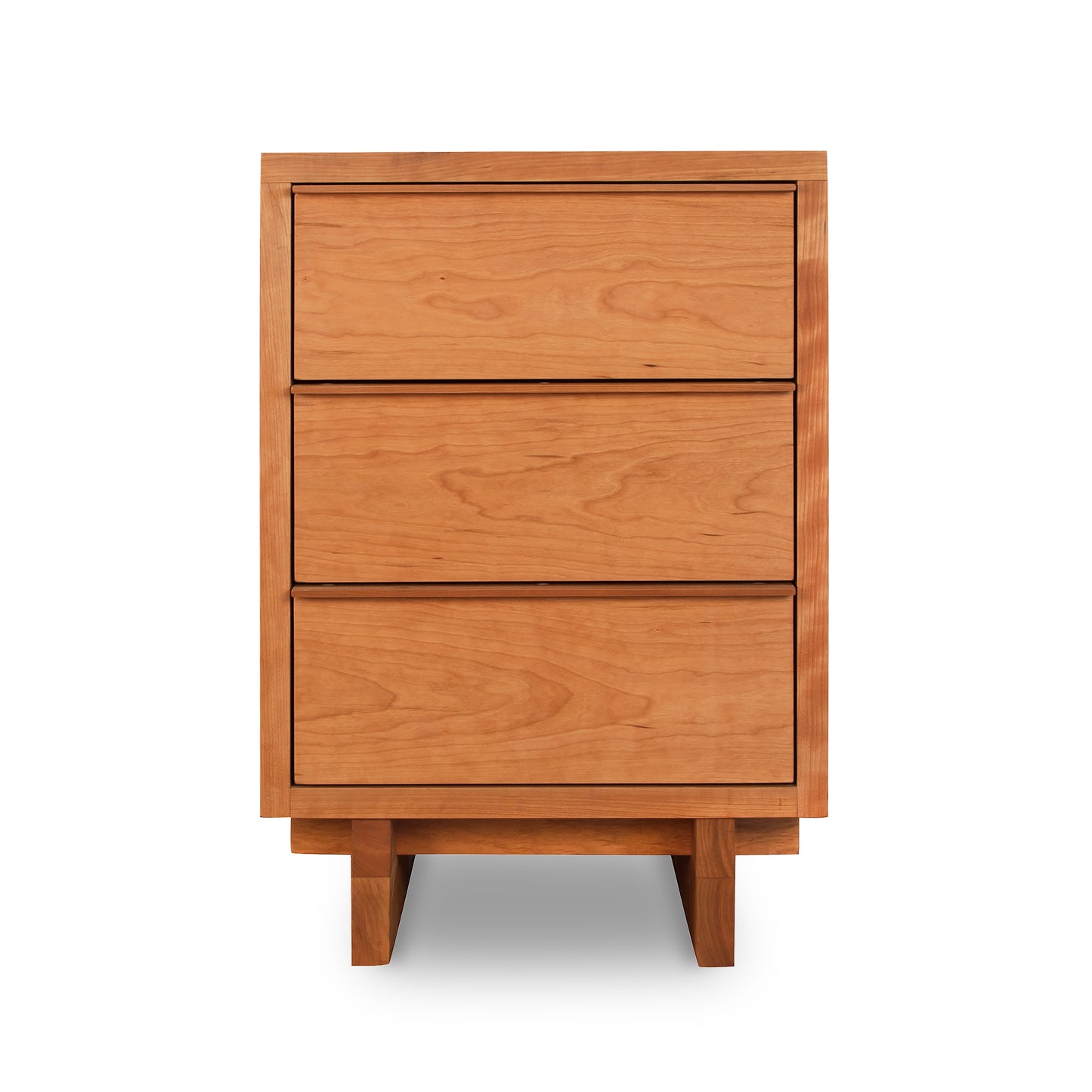 A modern design Vermont Furniture Designs Kipling 3-Drawer Nightstand in natural cherry against a white background.