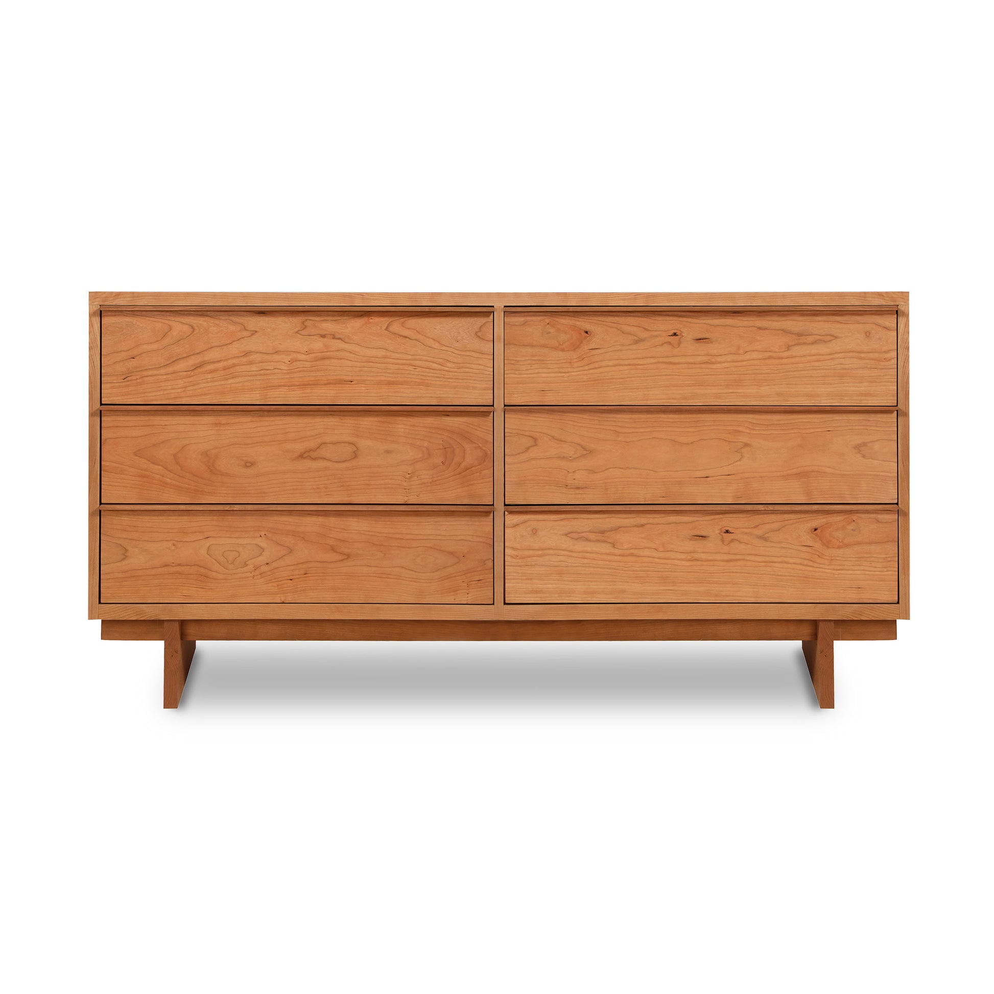 A modern design wooden six-drawer Vermont Furniture Designs Kipling Dresser on a plain background.