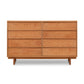 A Vermont Furniture Designs Kipling 8-Drawer Dresser made from cherry/maple/walnut hardwoods, featuring six drawers, standing on four angled legs, isolated on a white background.