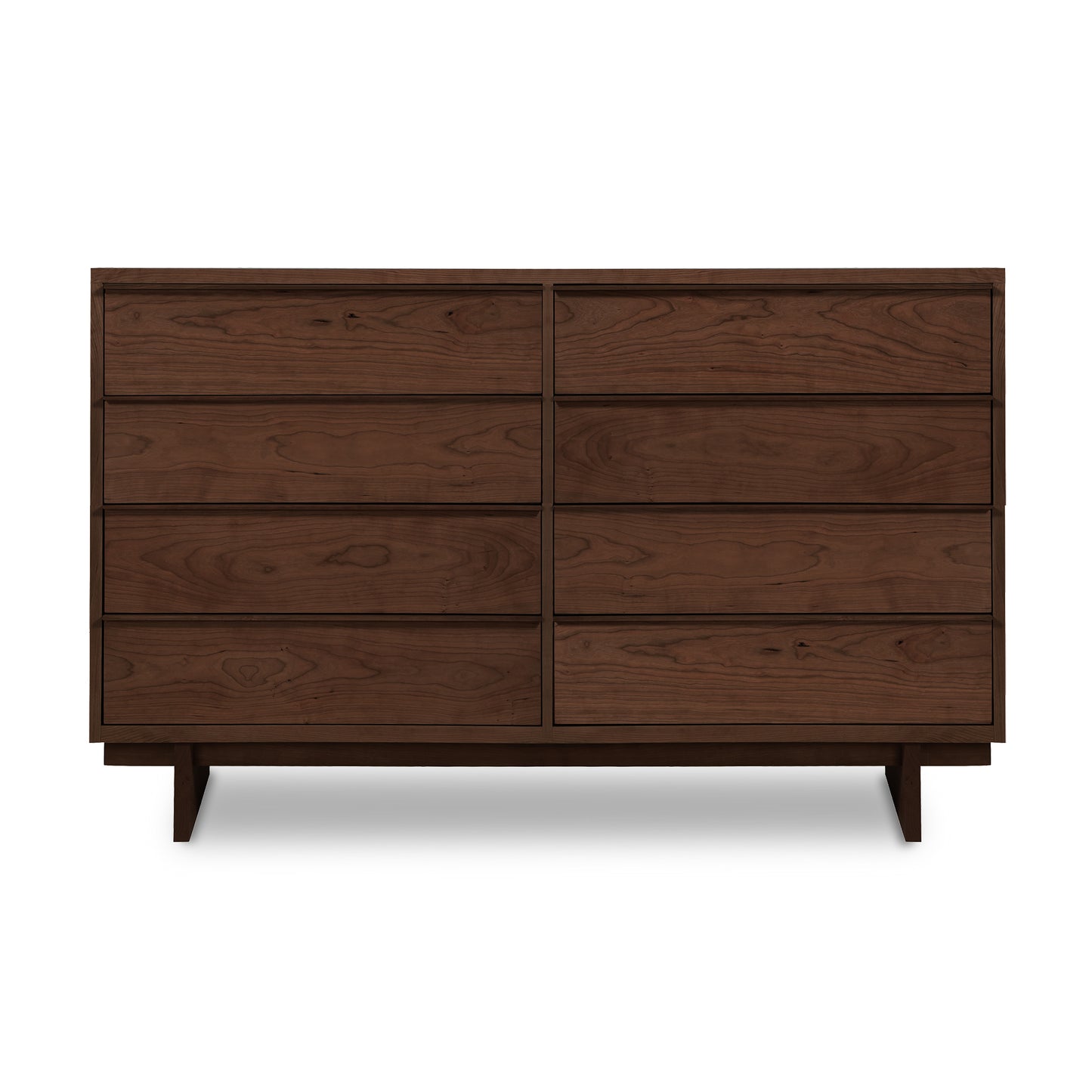 A modern solid wood dresser crafted from cherry hardwood, featuring six drawers, set against a plain background is the Vermont Furniture Designs Kipling 8-Drawer Dresser.