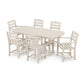 A POLYWOOD® La Casa Cafe 7-Piece Dining Set composed of a rectangular table and six chairs with armrests, arranged on a white background. The furniture is styled in simple and modern design, ideal.