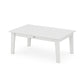 A simple white rectangular POLYWOOD Lakeside 23" x 36" coffee table with a slatted top and solid legs, isolated on a white background.
