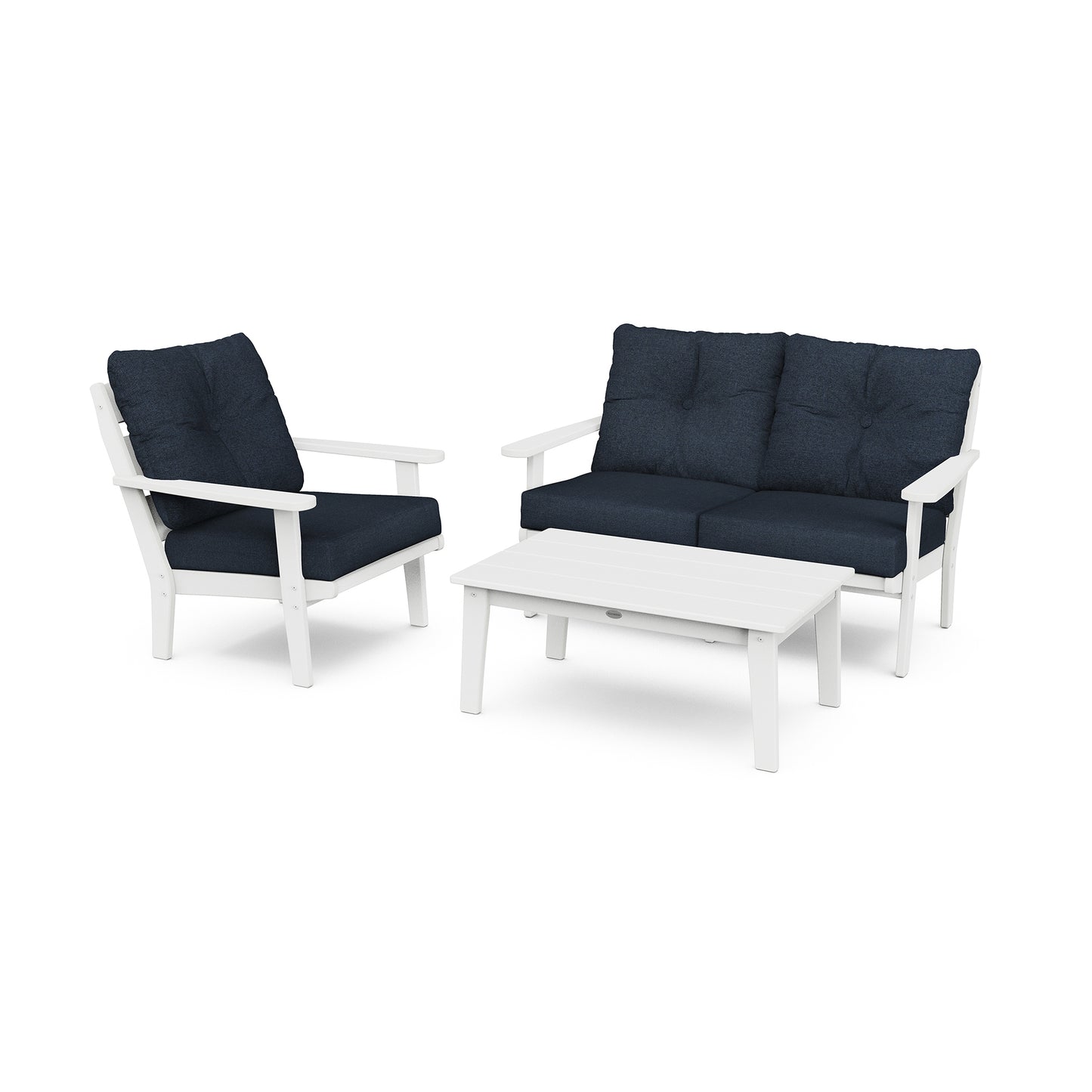 A set of POLYWOOD Lakeside 3-Piece Deep Seating Set featuring two white armchairs with dark blue cushions and a matching white rectangular coffee table, isolated on a white background.