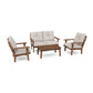 A POLYWOOD Lakeside 4-Piece Deep Seating Set with a POLYWOOD® lumber finish, featuring two single chairs, a double chair, and a rectangular coffee table, all accessorized with light.
