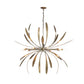 The handcrafted Large Dahlia Chandelier by Hubbardton Forge features a multitude of metal leaves, creating a stunning and dramatic lighting centerpiece.