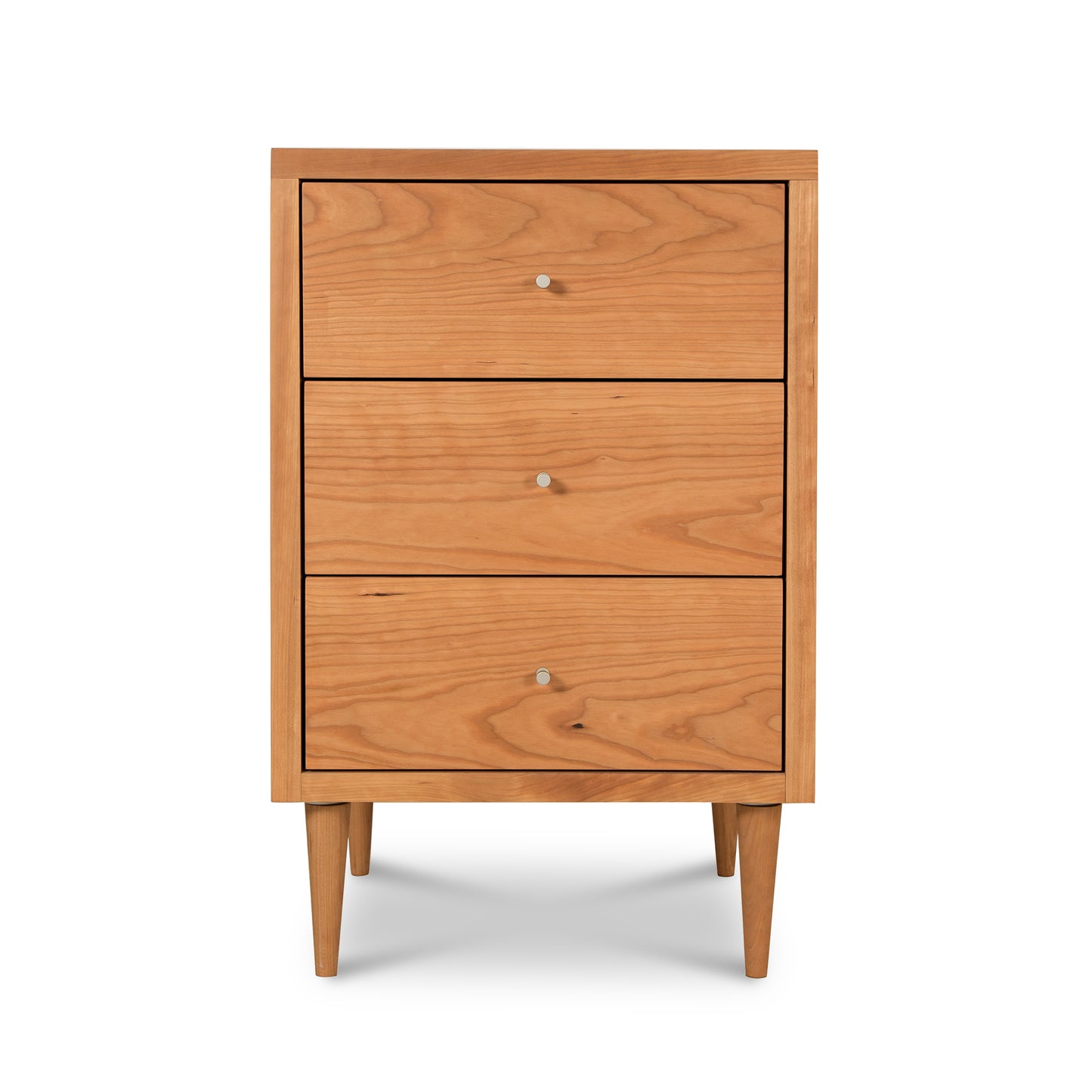 Vermont Furniture Designs Larssen 3-Drawer Nightstand crafted in natural hardwood featuring small knobs and tapered legs.