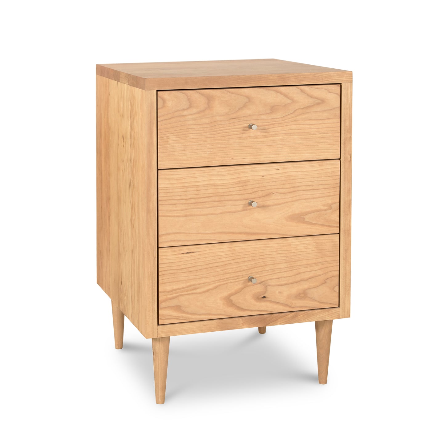 3-drawer nightstand from Vermont Furniture Designs' Larssen Collection with round knobs, tapered legs, and a natural finish.