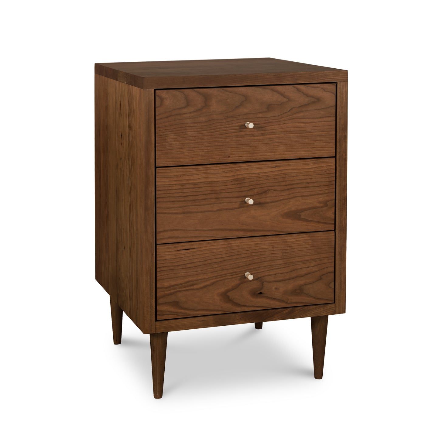 Mid-century modern Larssen 3-Drawer Nightstand by Vermont Furniture Designs with tapered legs and natural hardwood finish.