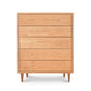 A mid-century modern style wooden five-drawer Larssen 5-Drawer Wide Chest with round knobs and angled legs on a white background. (Brand Name: Vermont Furniture Designs)