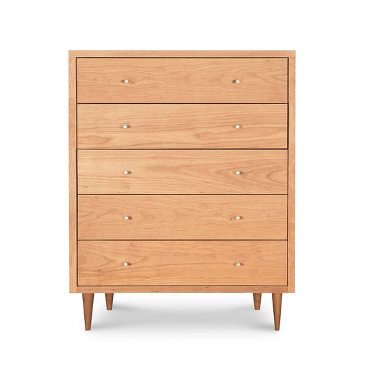 Larssen 5-Drawer Wide Chest in mid-century modern style with ample storage, small round knobs, and sleek tapered legs by Vermont Furniture Designs.
