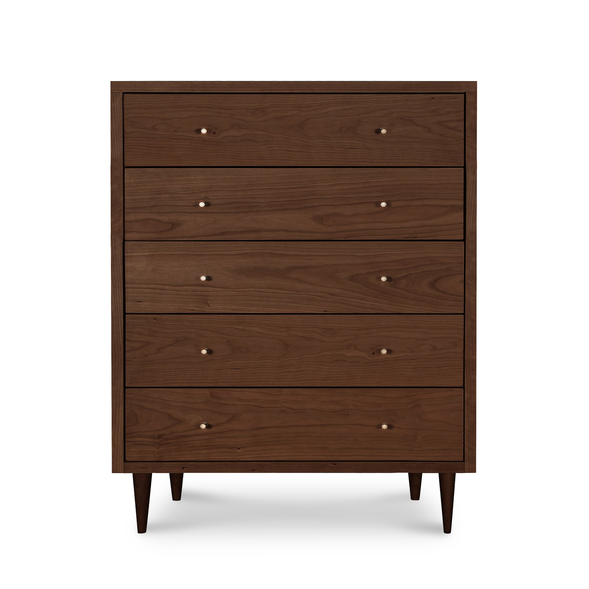 A mid-century modern style wooden five-drawer Vermont Furniture Designs Larssen 5-Drawer Wide Chest with round knobs and angled legs against a white background.
