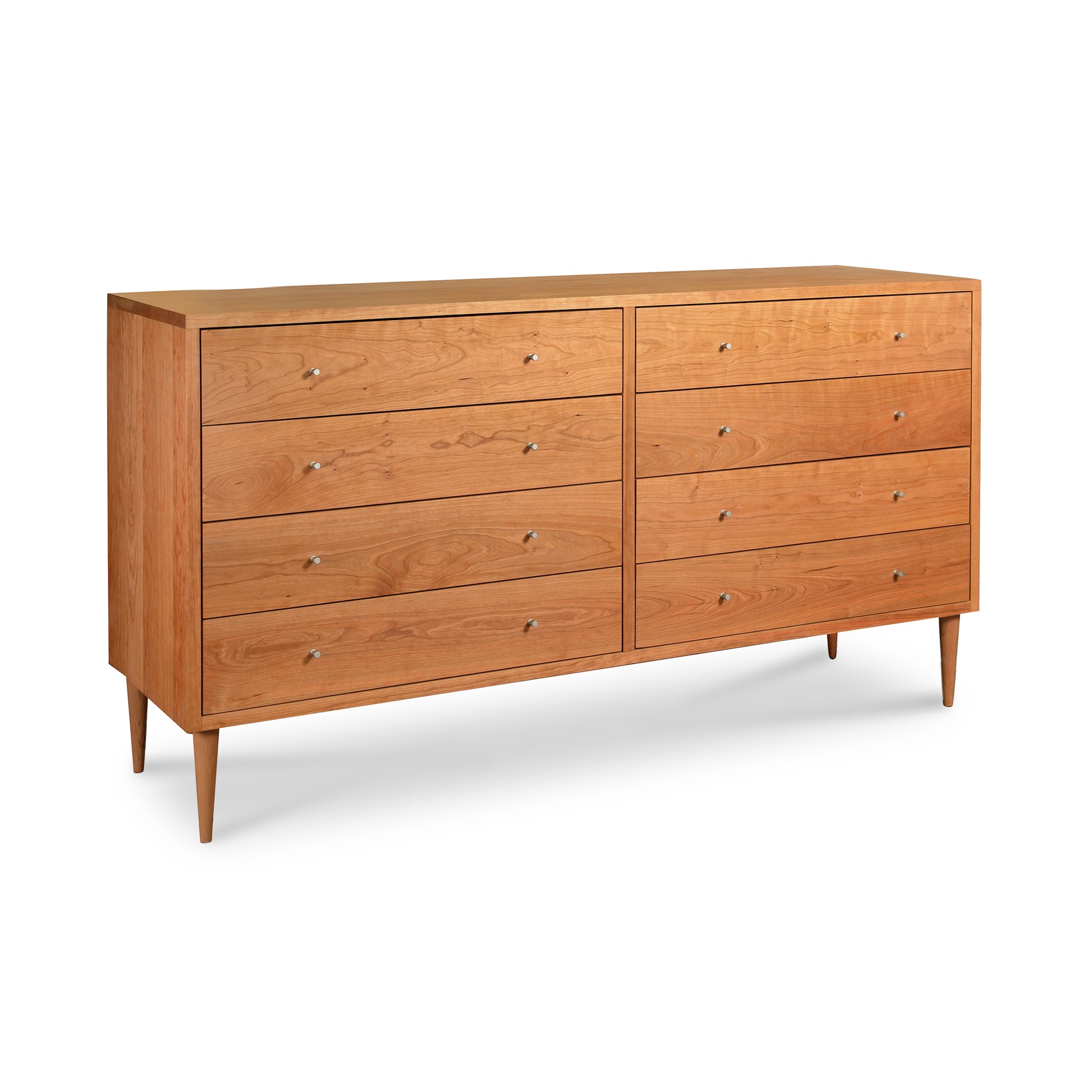 Larssen 8-Drawer Dresser by Vermont Furniture Designs, featuring mid-century modern style with sleek handles and tapered legs.