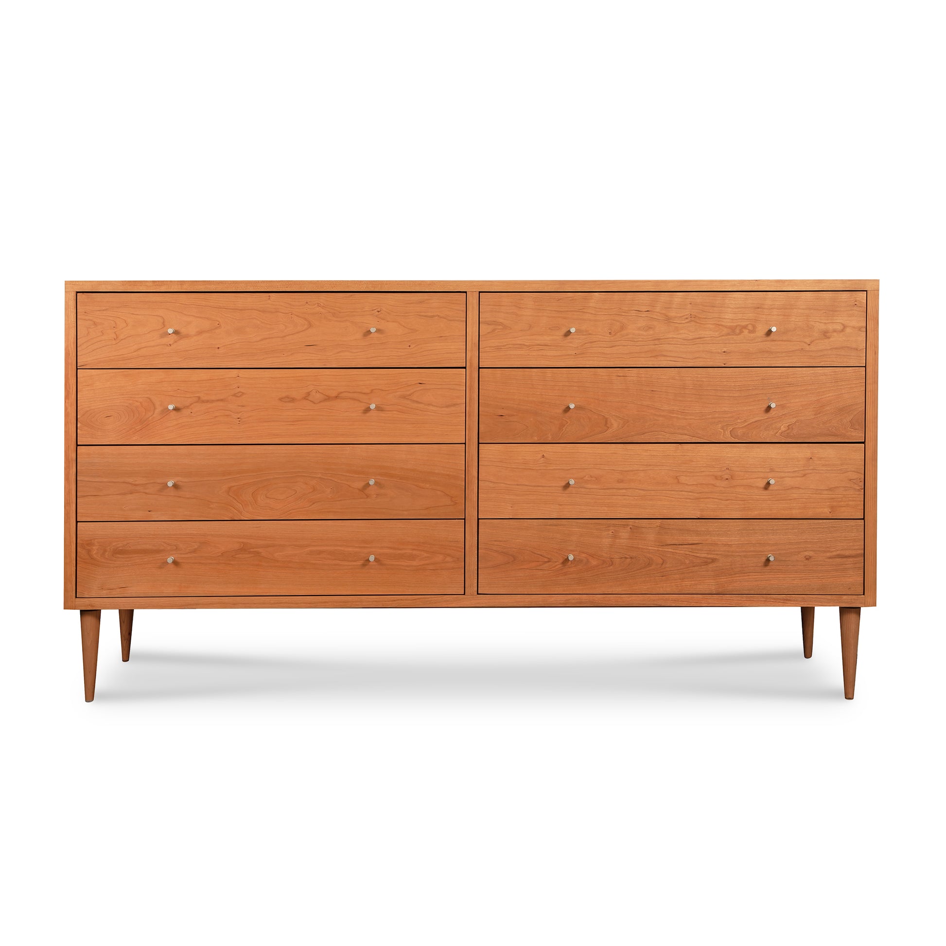 Larssen 8-Drawer Dresser by Vermont Furniture Designs in solid wood with a light finish, showcasing Mid-century modern style.