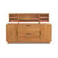 Solid cherry wood Linear Office Credenza with open shelving on top, housing books, and closed cabinets and drawers below by Copeland Furniture.