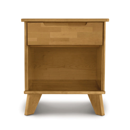 Linn nightstand by Copeland Furniture featuring angled legs, a drawer, and shelf in solid wood.