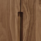 Close-up of a Copeland Furniture Lisse Buffet's wooden surface showing the detail of the wood grain and a gap between two joined panels.