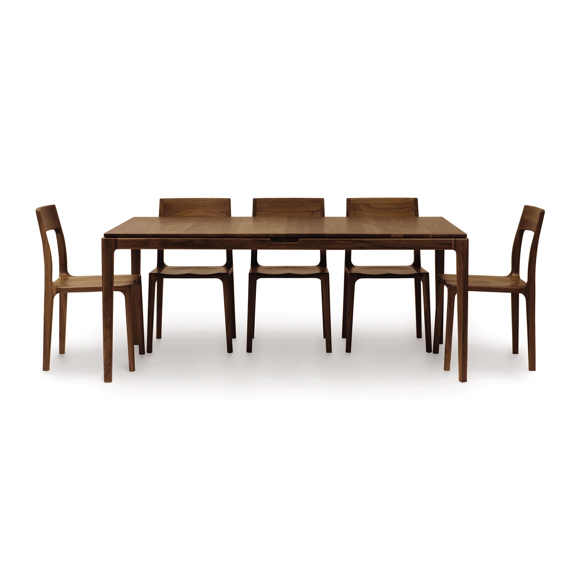 Minimalist walnut Lisse Extension Dining Table with six chairs by Copeland Furniture.
