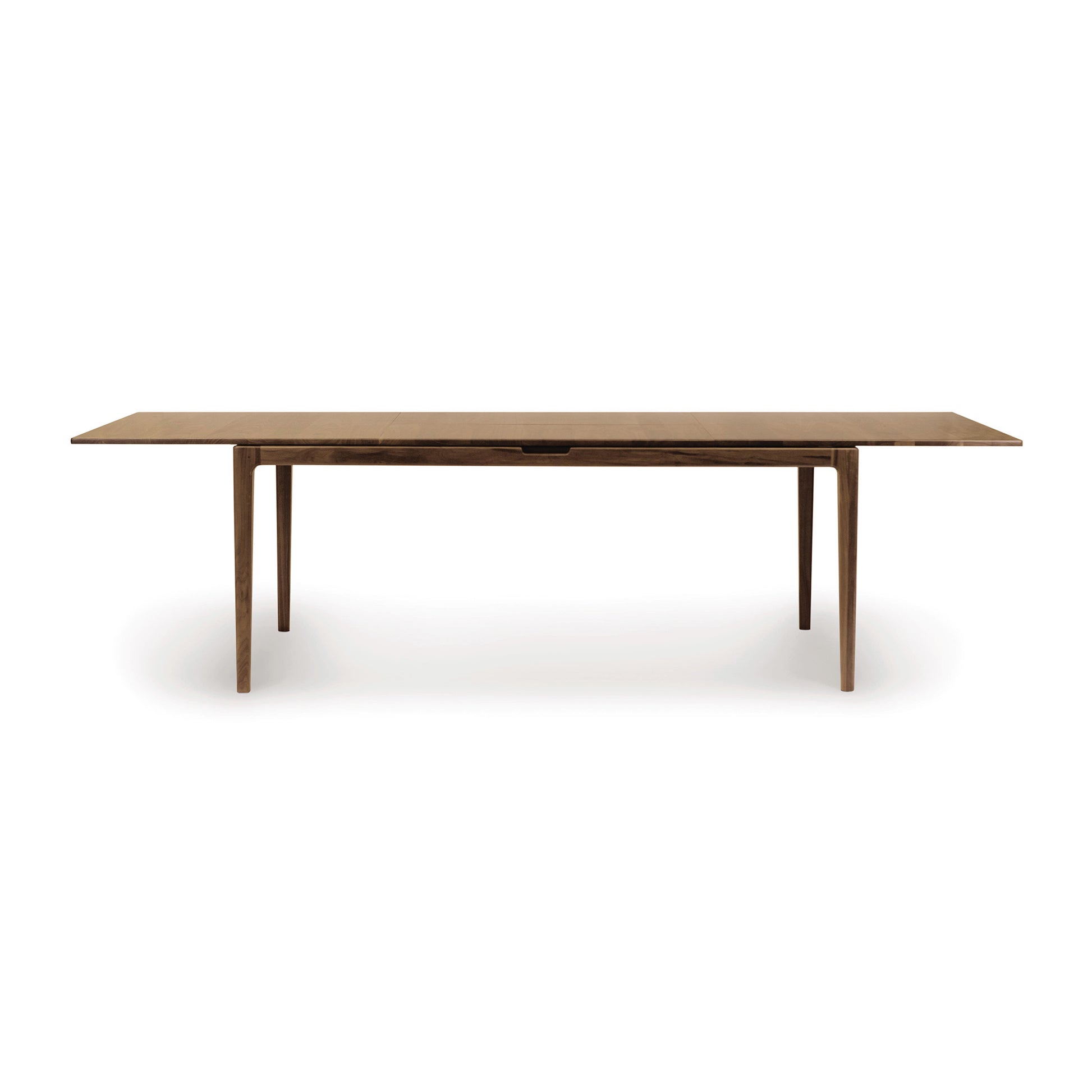 Lisse Extension Dining Table by Copeland Furniture - sleek, eco-friendly walnut table with slender legs.