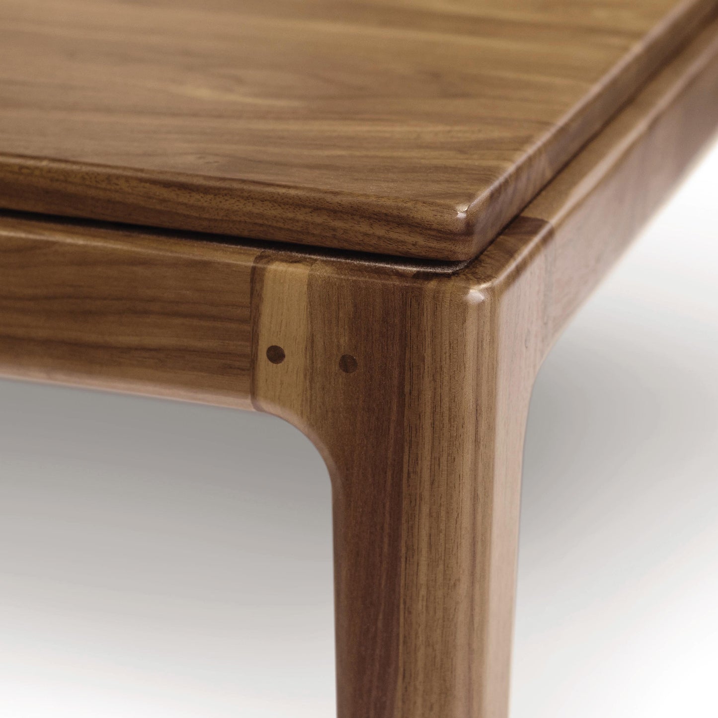 Lisse Extension Dining Table from Copeland Furniture showcasing its smooth, rounded edges and eco-friendly design.