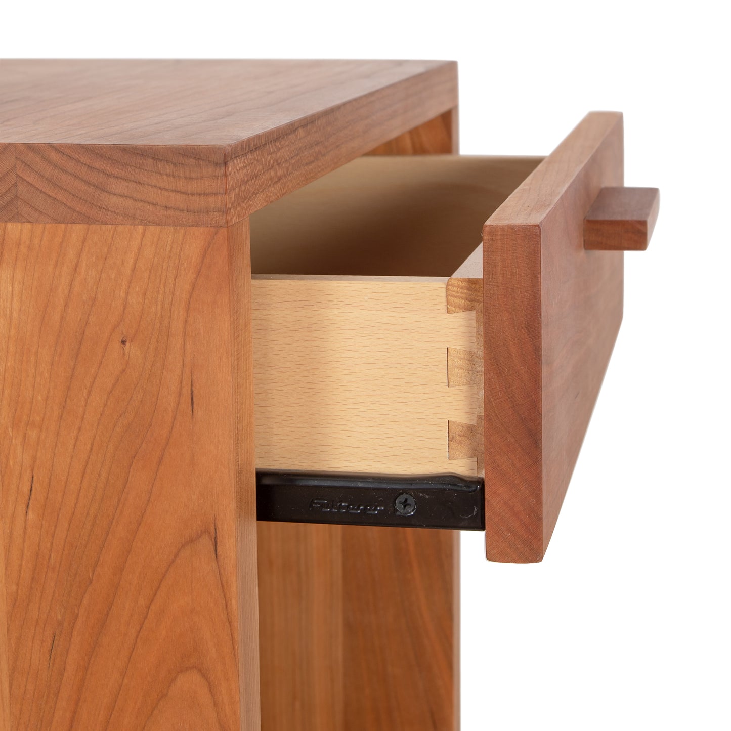 Vermont Furniture Designs Loft 1-Drawer Enclosed Shelf Nightstand with an open drawer showing dovetail joints and a metal drawer slide mechanism.