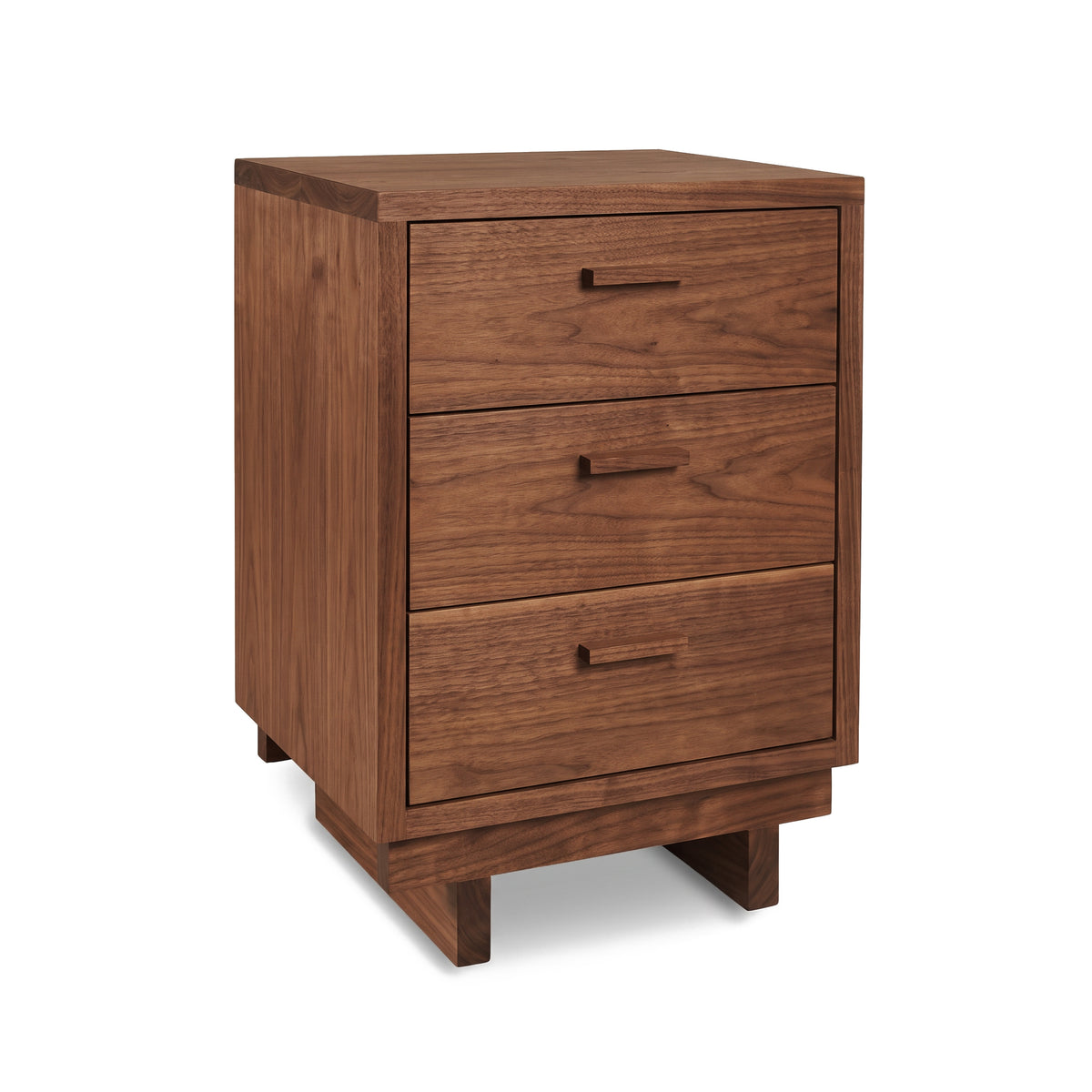 Vermont Furniture Designs Loft 3-Drawer Nightstand made of solid wood with rectangular handles, highlighting its modern craftsmanship.