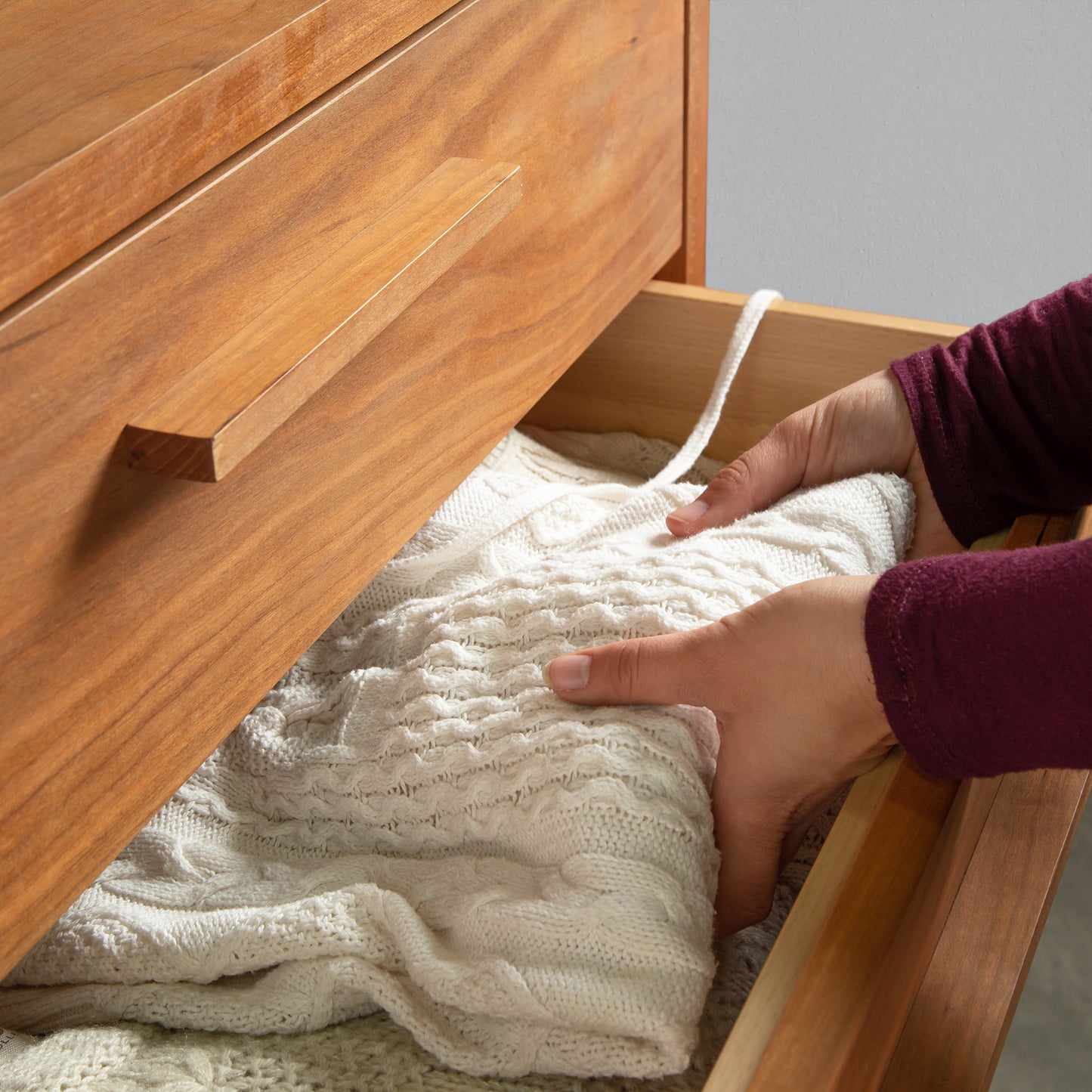 Vermont Furniture Designs Loft 5-Drawer Chest with top drawer open, showing spacious storage for clothing.
