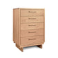 A solid hardwood Vermont Furniture Designs Loft 5-Drawer Chest isolated on a white background.