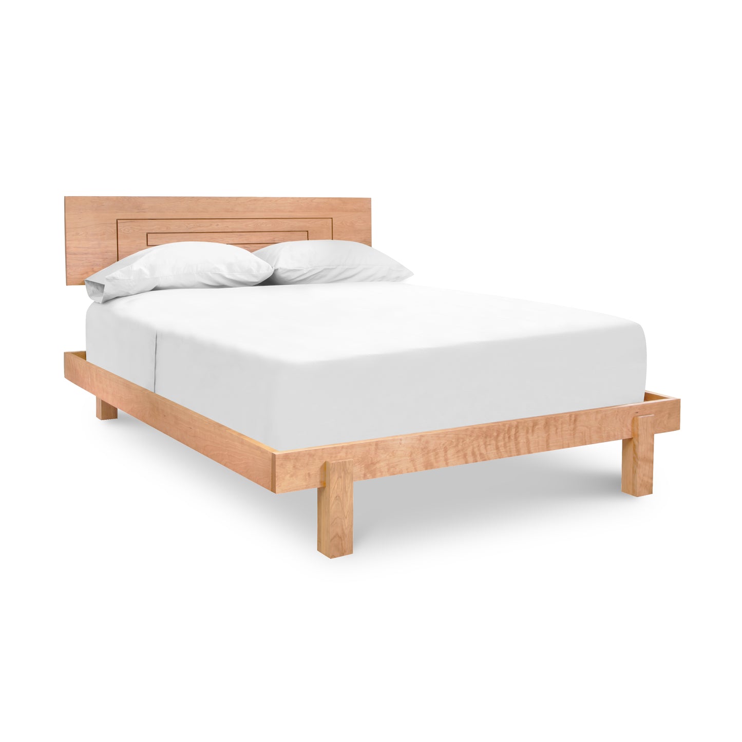 Cherry wood loft bed frame with headboard by Vermont Furniture Designs, featuring a white mattress and pillows.