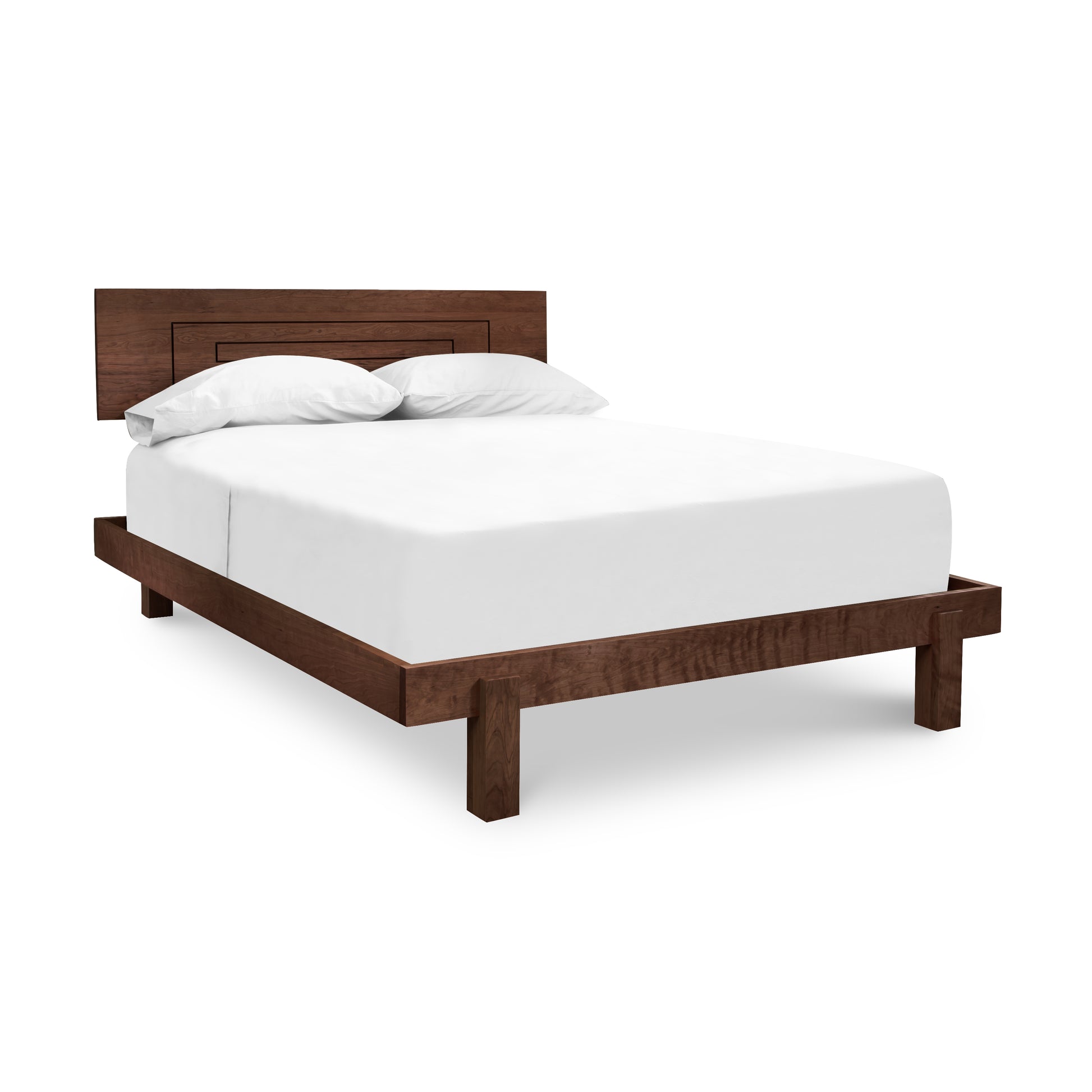A modern Vermont Furniture Designs Loft Bed made of solid cherry wood with an eco-friendly finish, complete with a white mattress and pillows on an isolated white background.