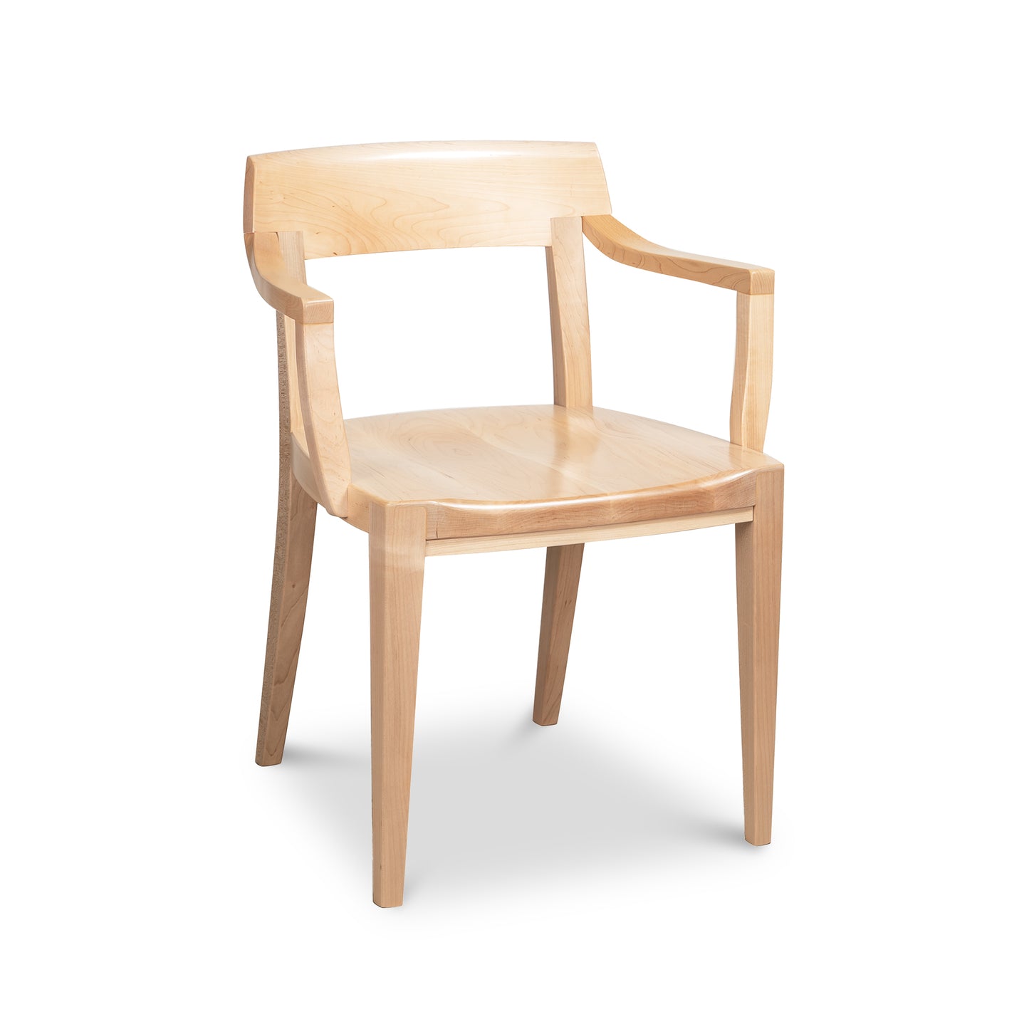 Ludlow Chair by Vermont Woods Studios with natural wood finish, curved backrest, angular arms, and four straight legs. Focus is on the chair’s design.