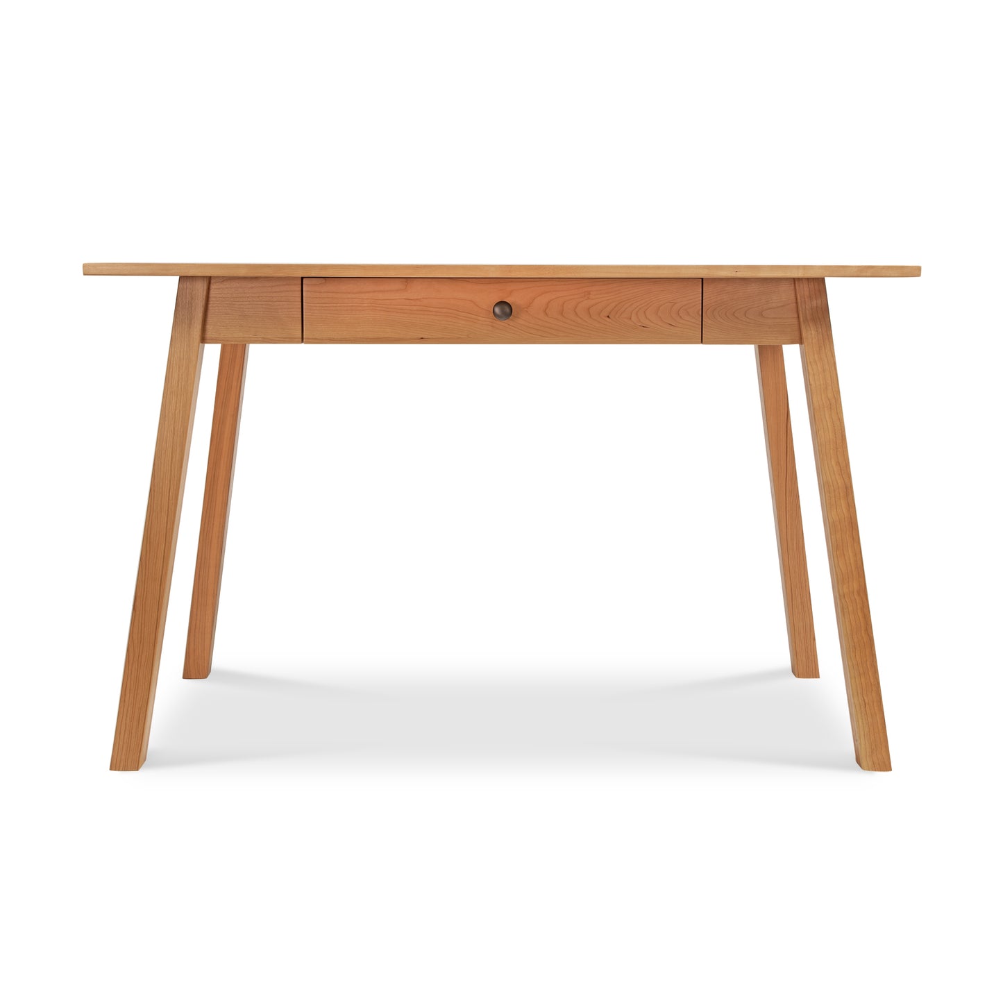 SEO-Optimized Alt Text: "Manchester Writing Desk from Vermont Woods Studios crafted in sustainable solid wood with a flat rectangular top, angled legs, and center drawer with round pull handle. Ideal for modern home office. Perfect American made furniture in natural wood finish.