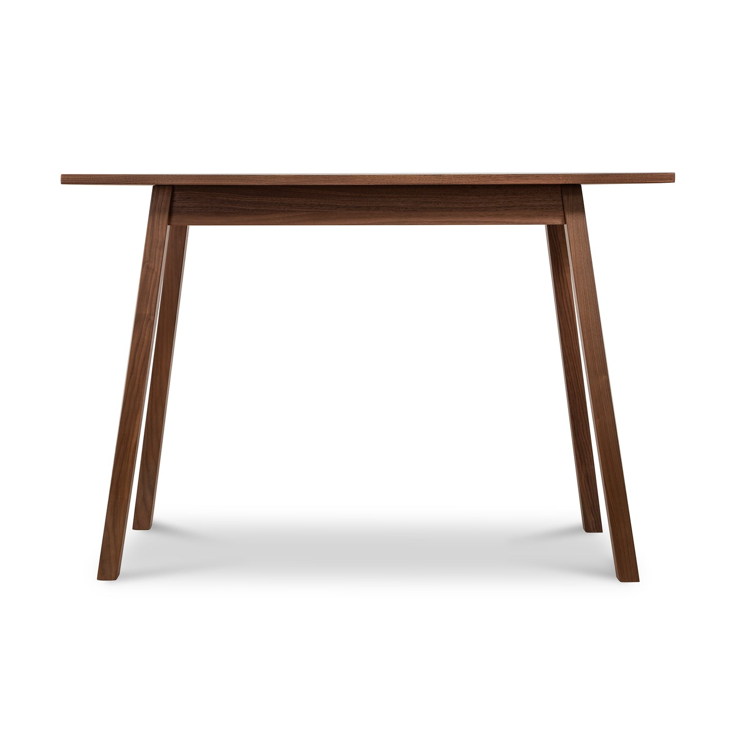 A dining table with a wooden top and legs.