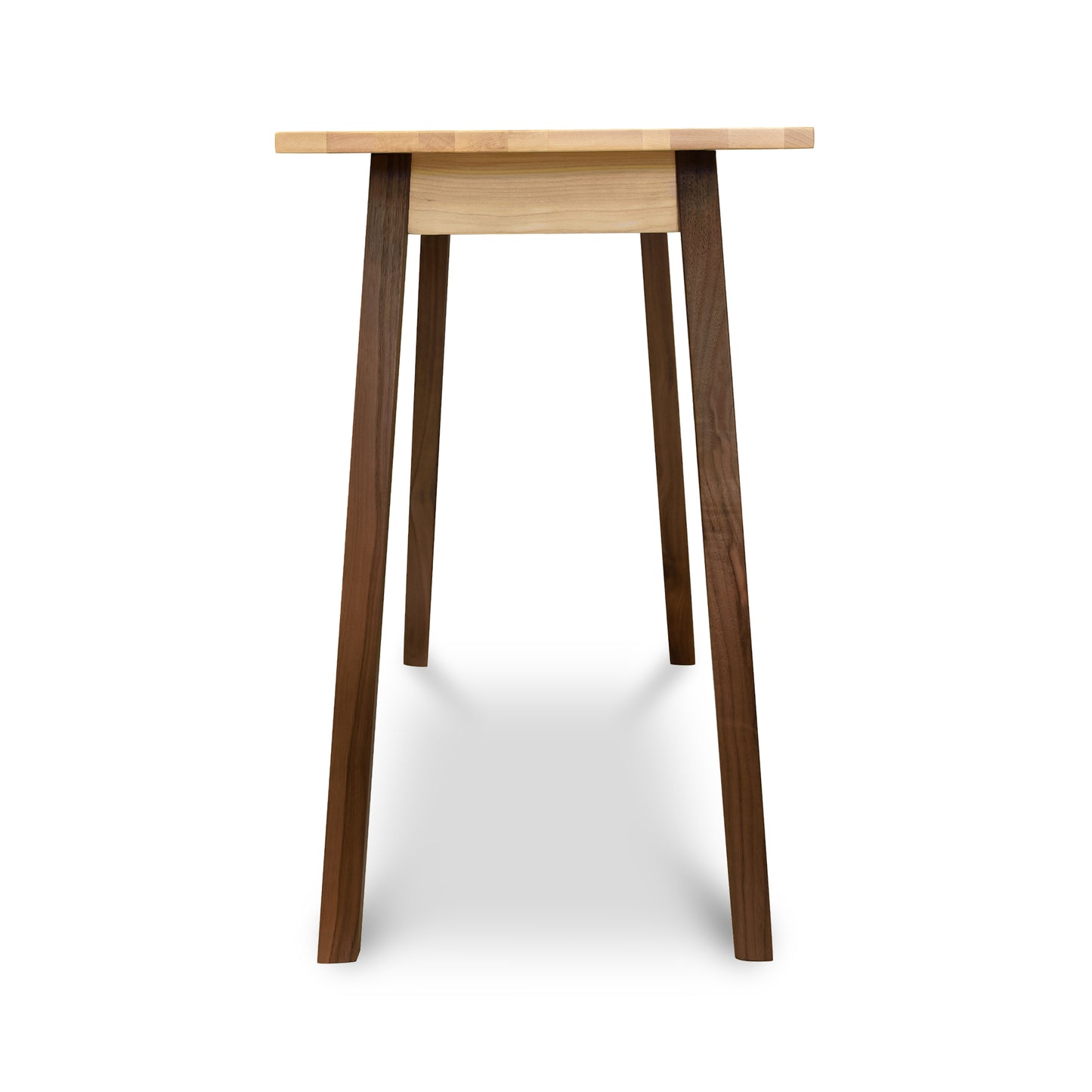 A table with a wooden top and wooden legs.