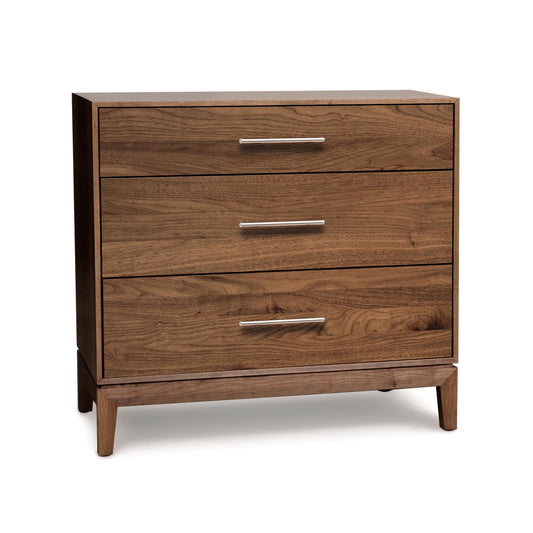 Mansfield 3-Drawer Chest featuring eco-friendly hardwood, smooth finish, and silver handles on short legs by Copeland Furniture.