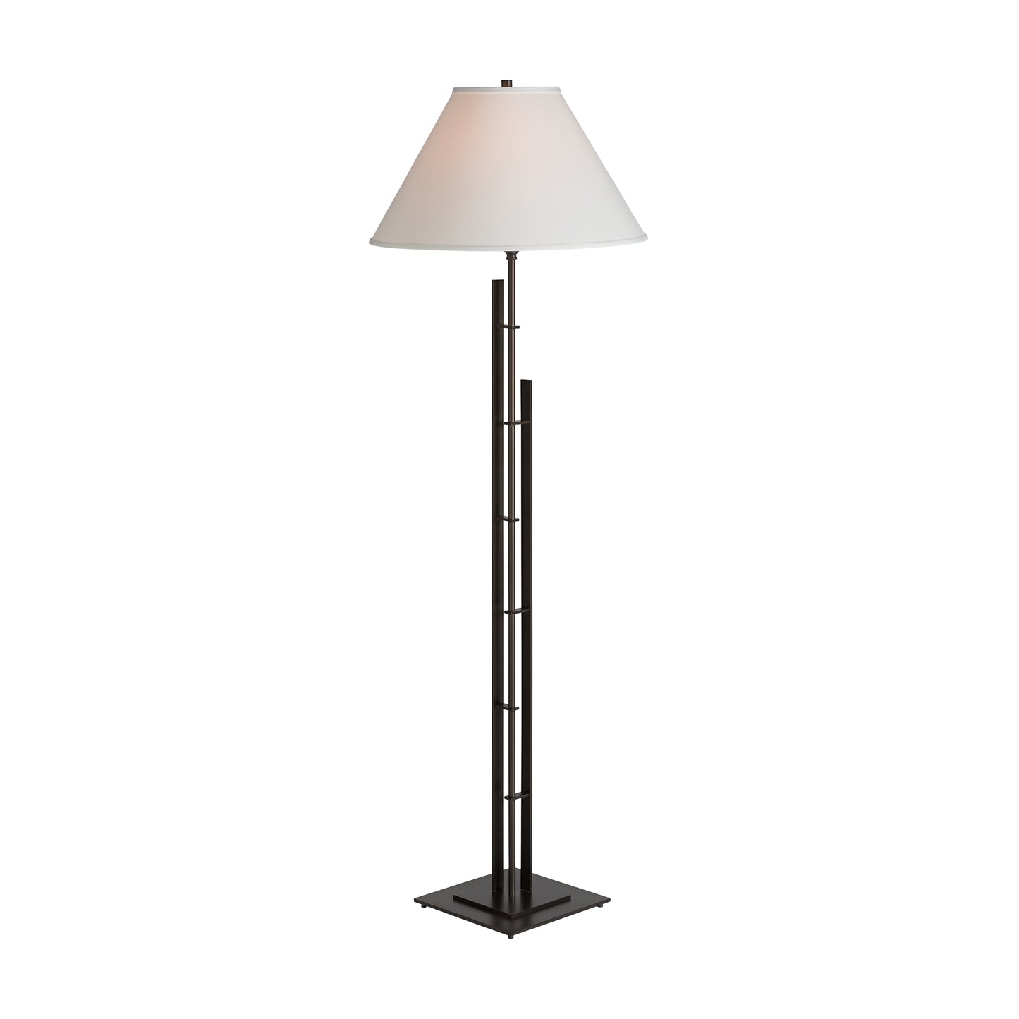 Metra Double Floor Lamp by Hubbardton Forge with white conical shade and dark tiered base, handcrafted in Vermont, highlighting American craftsmanship.
