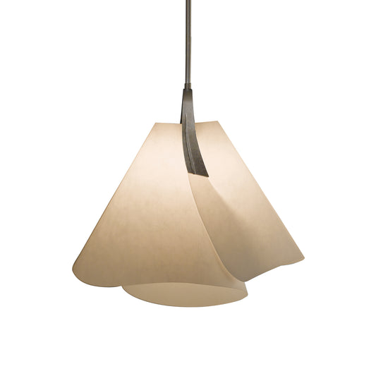 The Hubbardton Forge Mobius Small Pendant features a paper shade hanging from it.