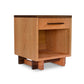A Vermont Furniture Designs Modern American 1-Drawer Enclosed Shelf Nightstand featuring a single drawer and an open lower shelf, set against a white background. The stand is made from well-finished light oak, highlighting a smooth, clean design.