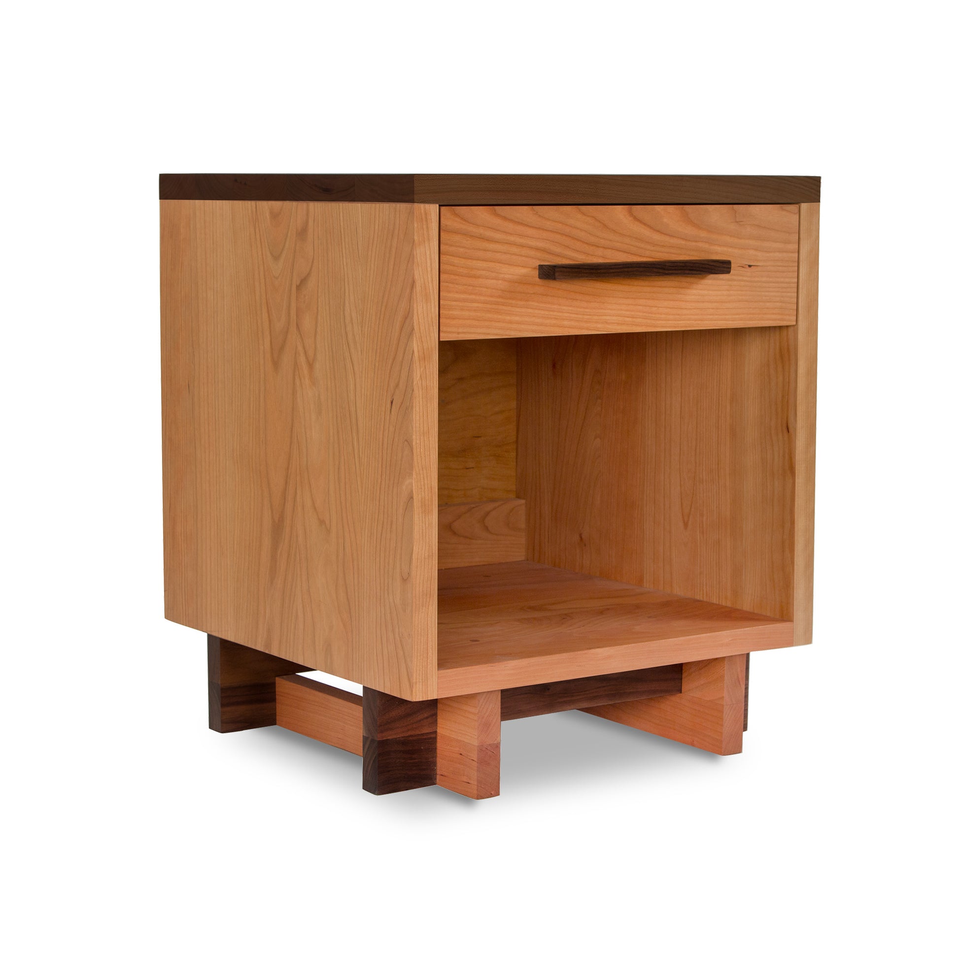 Modern American nightstand with 1 drawer and enclosed shelf, featuring short legs and prominent wood grain.