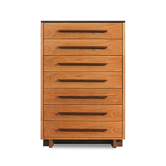 Modern American 7-Drawer Chest showcasing elegant solid wood construction and dark handles by Vermont Furniture Designs.
