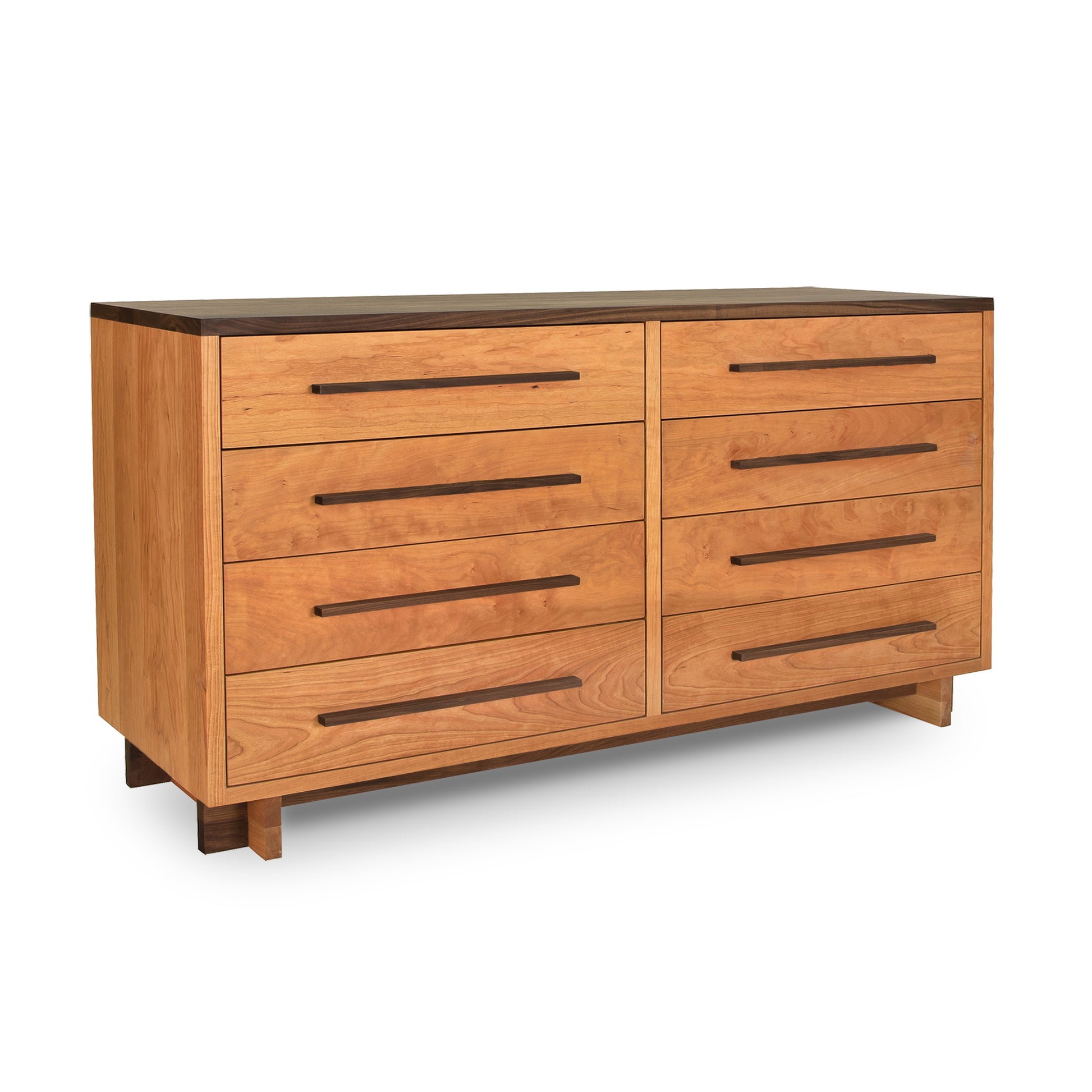Natural cherry wood dresser with a dark top and eight drawers, handcrafted by Vermont Furniture Designs.