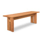 A Modern American Bench by Vermont Furniture Designs with a simple, sturdy design, isolated on a white background.