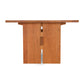 Solid wood construction Modern American Dining Table by Vermont Furniture Designs viewed from the front against a white background.