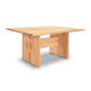 A Vermont Furniture Designs Modern American Dining Table with a simplistic design, featuring an eco-friendly oil finish and visible grain, with a central drawer, isolated on a white background.